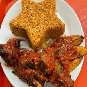 Jollof Rice, Stewed Fried Goat Meat and Plantains