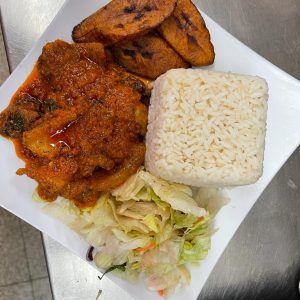 White Rice, Stewed Gizzards, Plantains and Salad